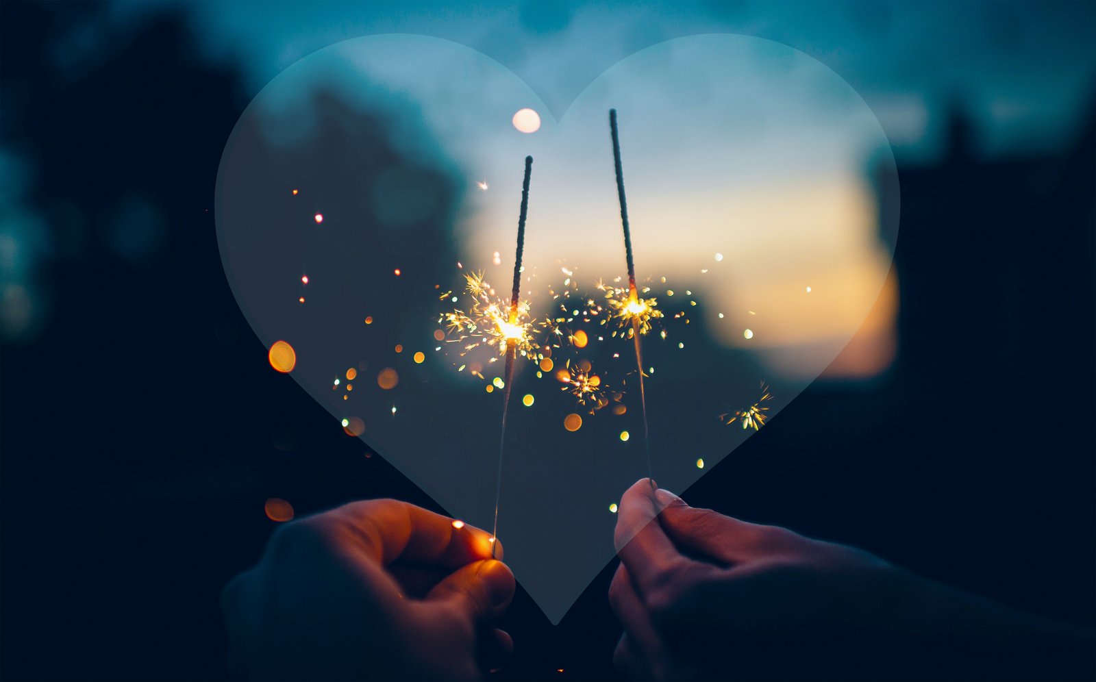 Couple in love with sparklers for new year